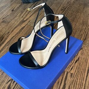 Stuart Weitzman “NudistSong” Black Leather Sandals